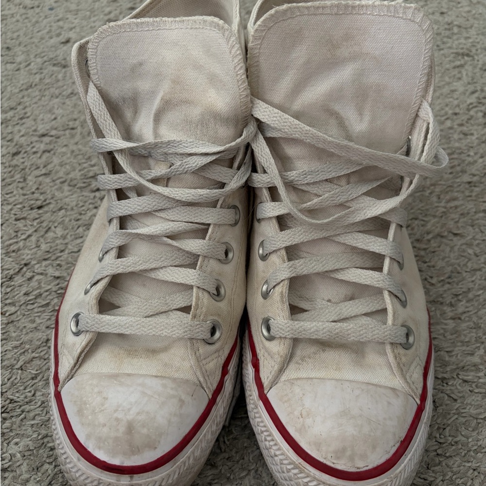 Well worn white Converse high tops (10.5W / 8.5M)